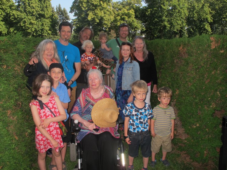 Three generations of the Finnish family gather at their mother/grandmother/great gran mother's grave in Helsinki